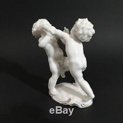 Antique, porcelain figurine Fighting Cherubs. K. Tutter for Hutschenreuther