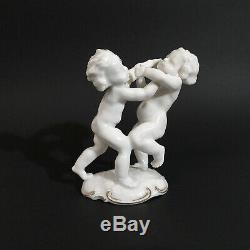 Antique, porcelain figurine Fighting Cherubs. K. Tutter for Hutschenreuther