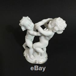 Antique, porcelain figurine Fighting Cherubs. K. Tutter for Hutschenreuther