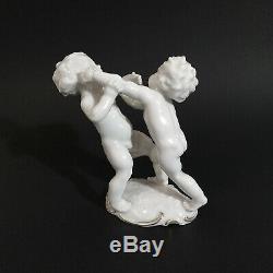 Antique, porcelain figurine Fighting Cherubs. K. Tutter for Hutschenreuther