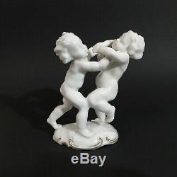 Antique, porcelain figurine Fighting Cherubs. K. Tutter for Hutschenreuther