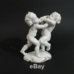 Antique, porcelain figurine Fighting Cherubs. K. Tutter for Hutschenreuther