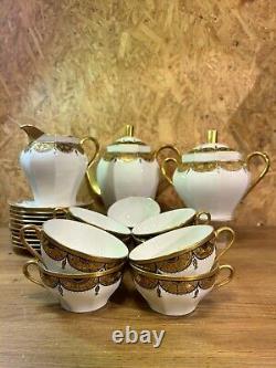 Coffee service porcelain of limoges, art deco, signed by decorator glitter, 30