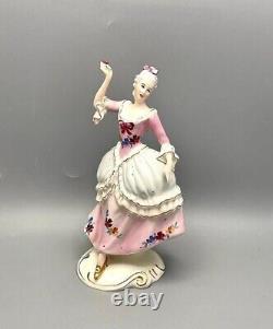 Figurine Women porcelain Lady with a flower