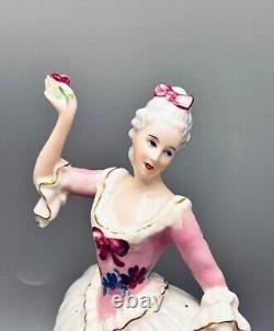 Figurine Women porcelain Lady with a flower