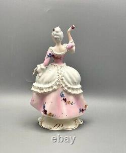 Figurine Women porcelain Lady with a flower