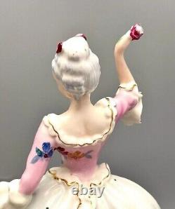 Figurine Women porcelain Lady with a flower