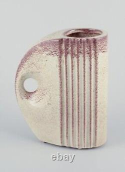 French ceramicist. A pair of Art Deco jug-shaped vases with handles