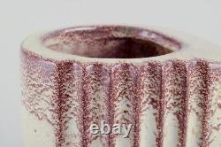French ceramicist. A pair of Art Deco jug-shaped vases with handles