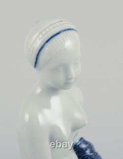 Georg Thylstrup, Royal Copenhagen. Art Deco porcelain figurine of nude woman