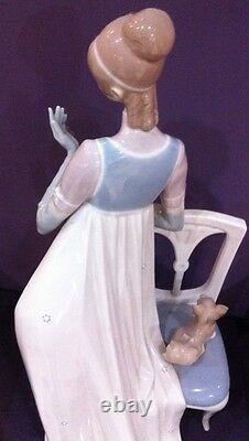 Lladro Lady Empire Porcelain Figurine with tall chair and dog