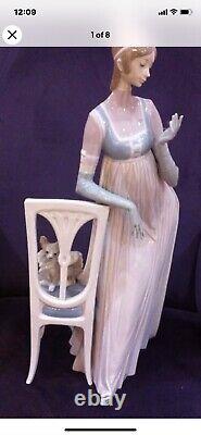 Lladro Lady Empire Porcelain Retired Figurine with tall chair and dog. Mint Cond