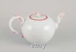 Meissen, Germany. Art Deco porcelain teapot decorated with coral red trim