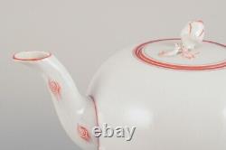 Meissen, Germany. Art Deco porcelain teapot decorated with coral red trim