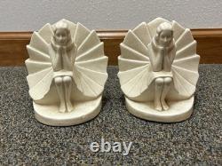 Rare German Porcelain Art Deco Seated Woman with Skirt Bookend Pair