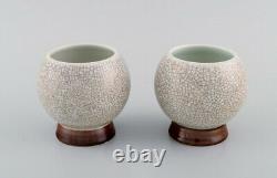 Two Art Deco Bing & Grøndahl vases in hand-painted crackle porcelain. 1920s