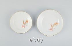 Two rare Art Deco Meissen plates with hand-painted peacocks and gold decoration