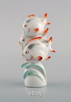 Willi Münch-Khe (1885-1960) for Meissen. Three fish in hand-painted porcelain